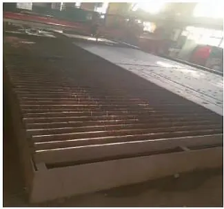 Fig1 CNC plasma cutting machine with cutting table